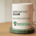Carroll Technology & Innovation Council Breakfast Club mug — coffee, conversation, and idea-sharing